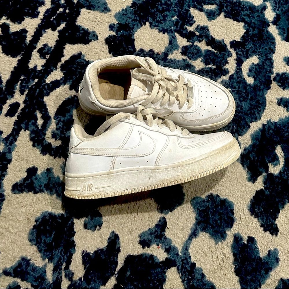 All white nike Air Force 1s